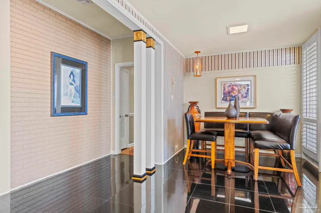 a kitchen with stainless steel appliances a stove a sink a stove a refrigerator and cabinets