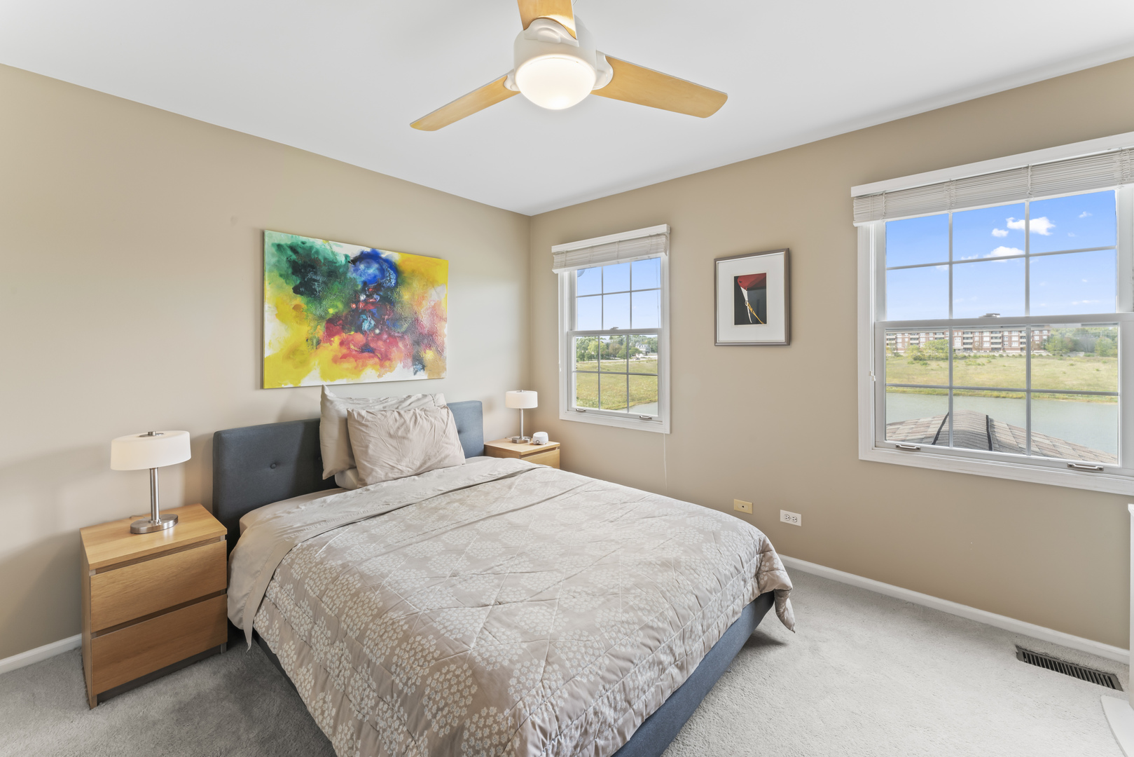 566 West Bridge View Court Palatine, IL 60067 - Photo 21 of 41 a bedroom with a bed and a painting on the wall