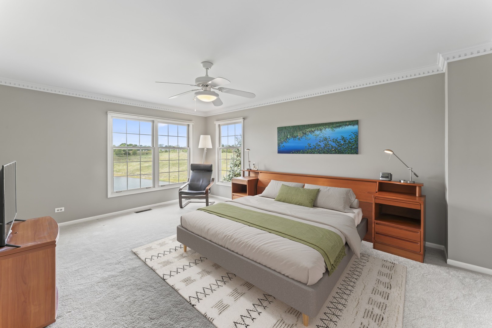 566 West Bridge View Court Palatine, IL 60067 - Photo 23 of 41 a bedroom with a large bed couch and a window