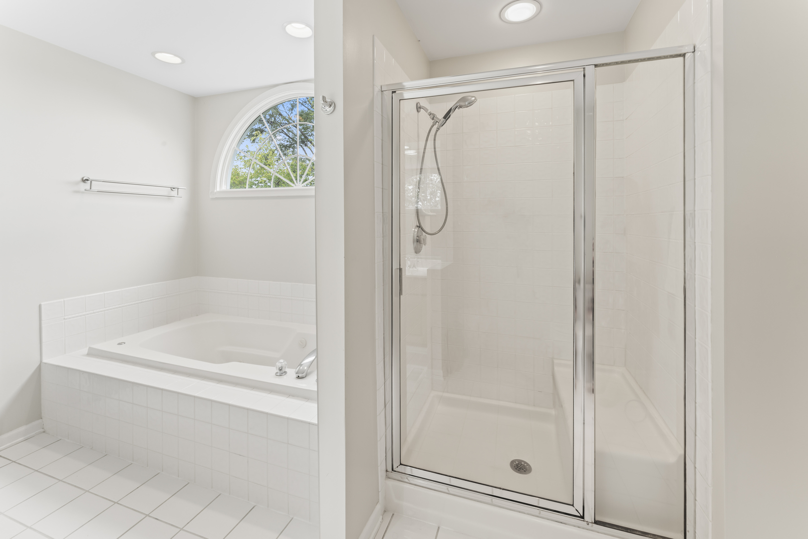 566 West Bridge View Court Palatine, IL 60067 - Photo 26 of 41 a bathroom with a shower and a bathtub