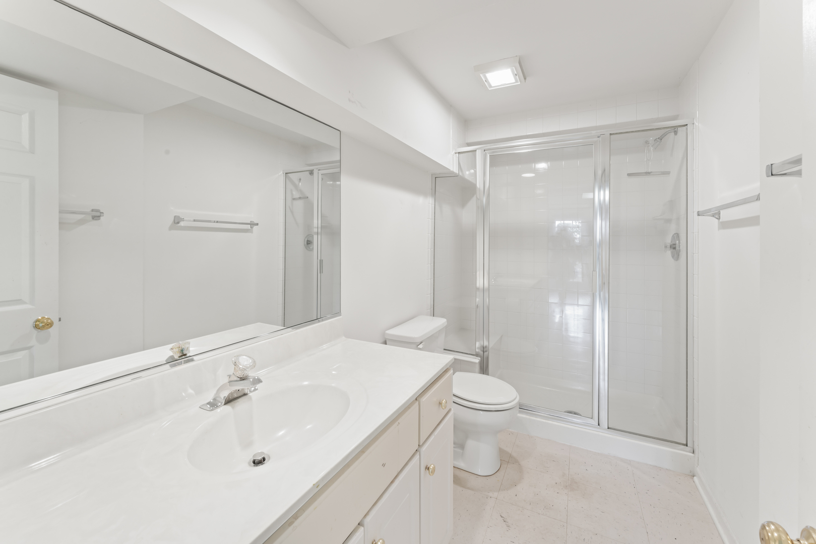 566 West Bridge View Court Palatine, IL 60067 - Photo 29 of 41 a bathroom with a sink a toilet and shower