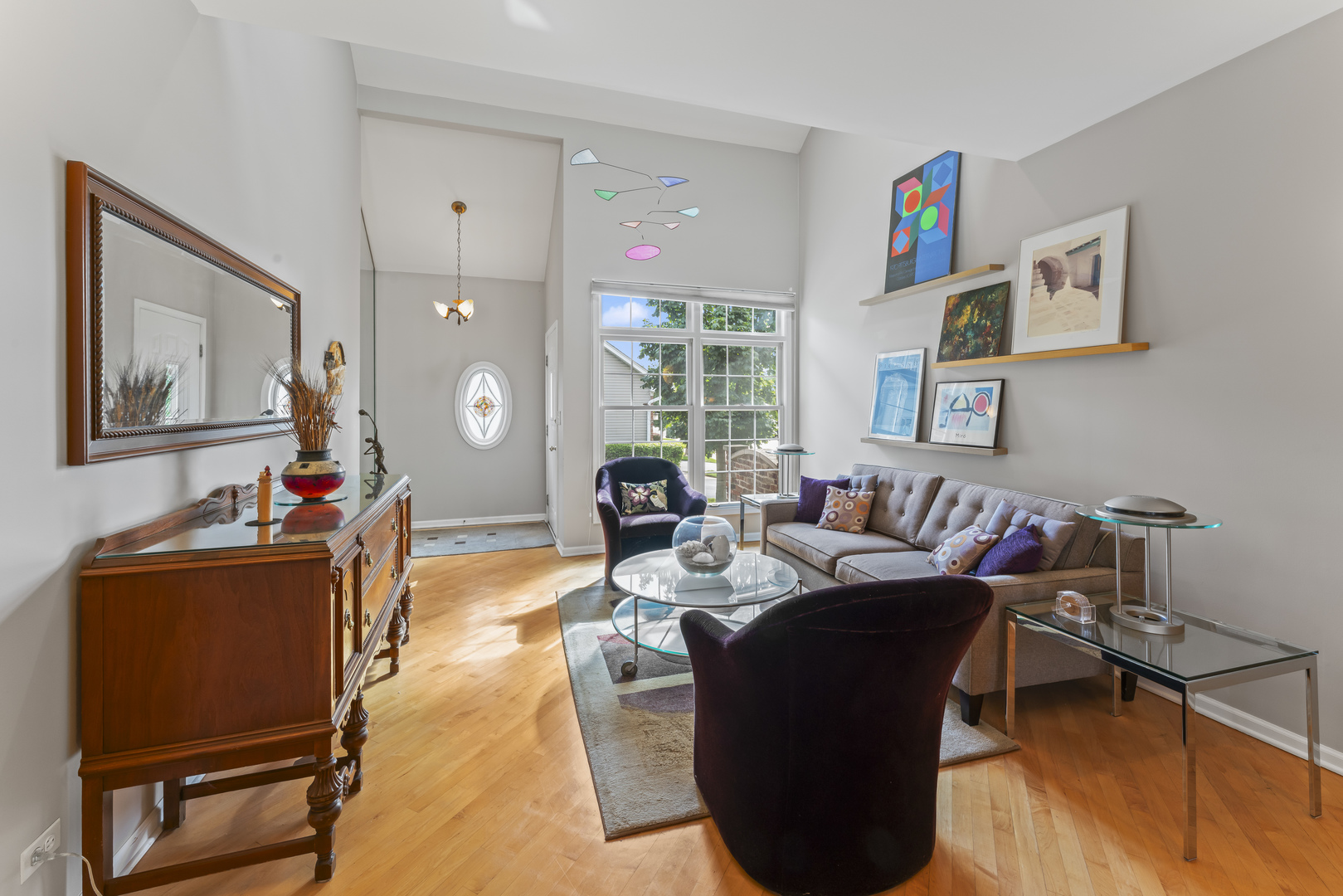 566 West Bridge View Court Palatine, IL 60067 - Photo 4 of 41 a living room with furniture and a large window