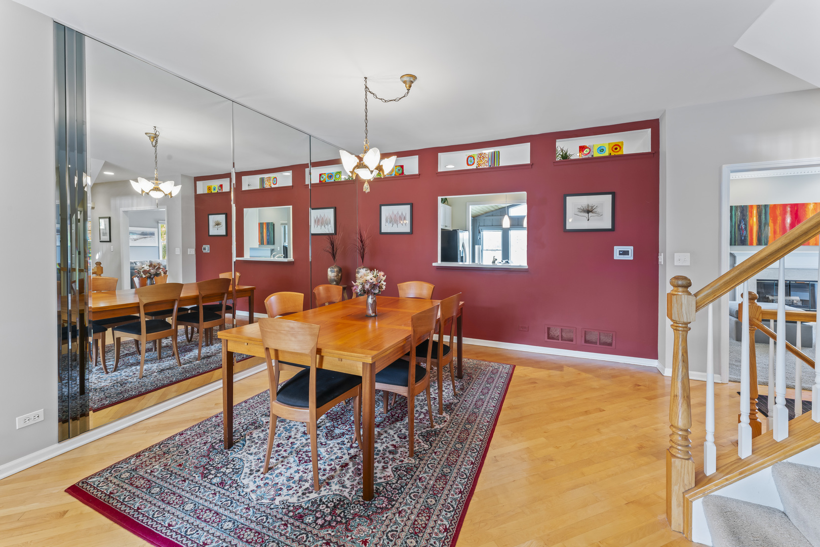 566 West Bridge View Court Palatine, IL 60067 - Photo 5 of 41 a living room with furniture a rug and a chandelier