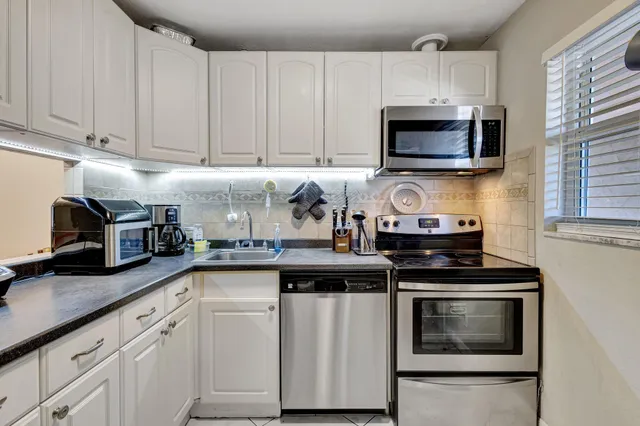 $130,000 | 12012 Greenway Circle South, Unit 205, Royal Palm Beach, FL 33411