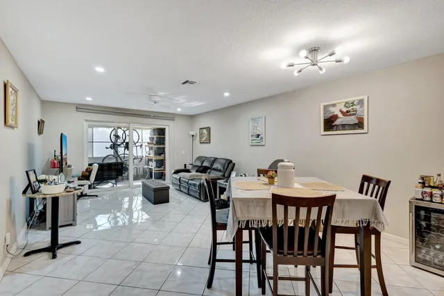 $130,000 | 12012 Greenway Circle South, Unit 205, Royal Palm Beach, FL 33411