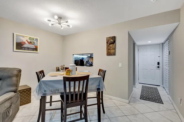 $130,000 | 12012 Greenway Circle South, Unit 205, Royal Palm Beach, FL 33411