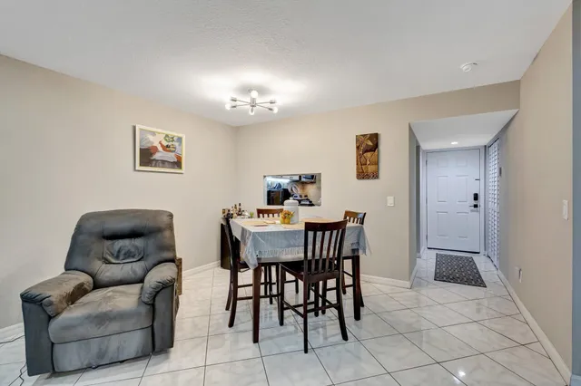 $130,000 | 12012 Greenway Circle South, Unit 205, Royal Palm Beach, FL 33411