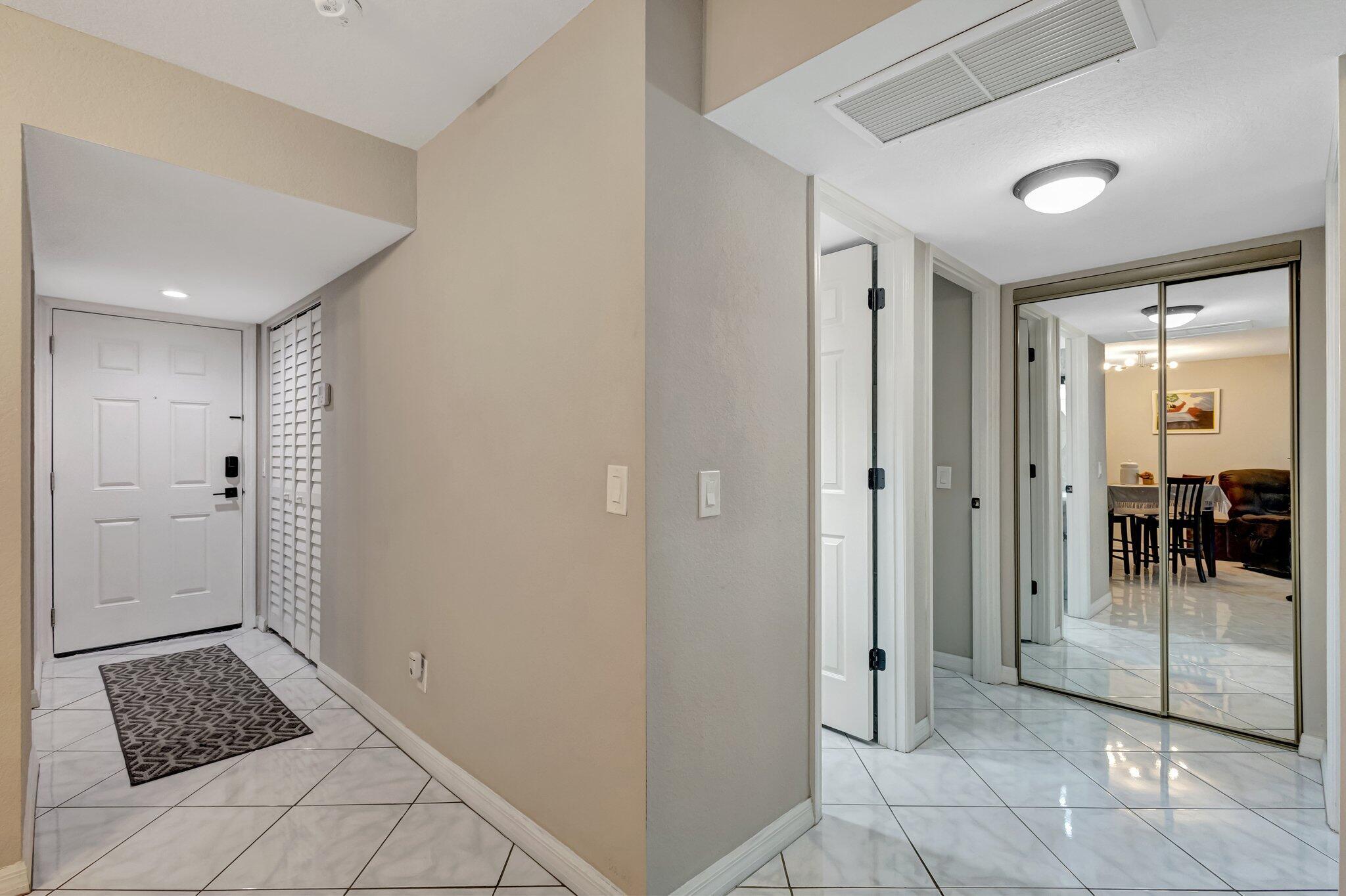 12012 Greenway Circle South, Unit 205 Royal Palm Beach, FL 33411 - Photo 20 of 36 a view of a hallway