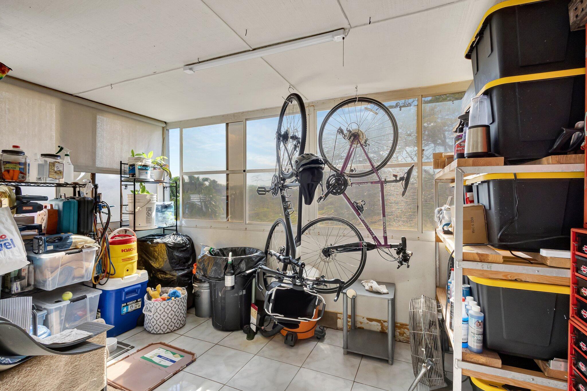 12012 Greenway Circle South, Unit 205 Royal Palm Beach, FL 33411 - Photo 23 of 36 a view of gym equipment and children play room