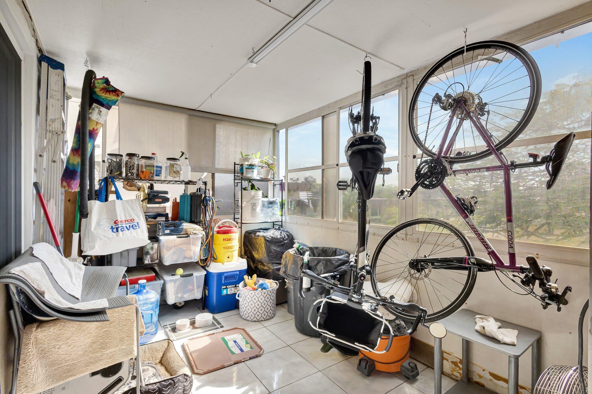 12012 Greenway Circle South, Unit 205 Royal Palm Beach, FL 33411 - Photo 24 of 36 a room with gym equipment