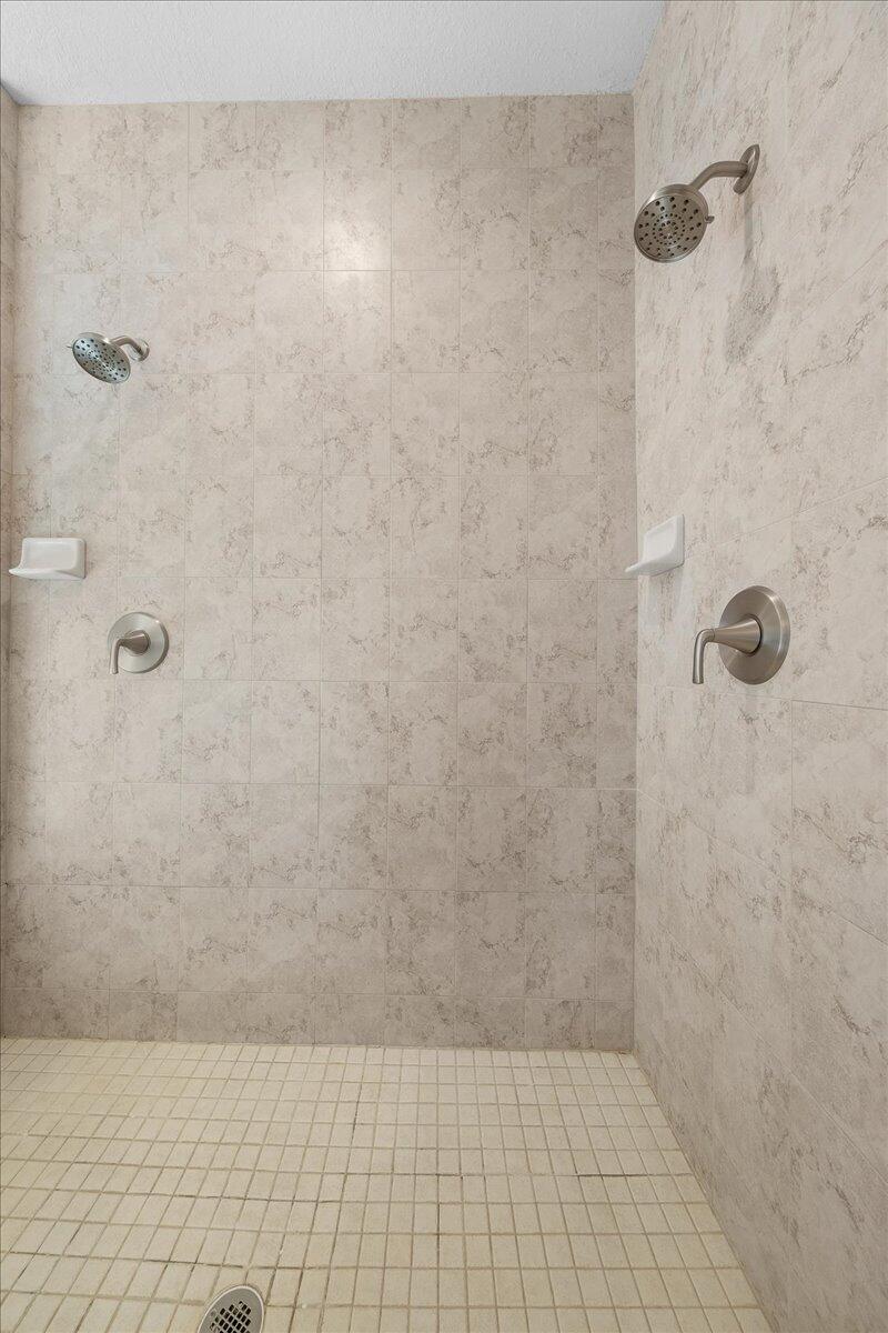 2940 Pomello Road Malabar, FL 32950 - Photo 20 of 42 a bathroom with a shower