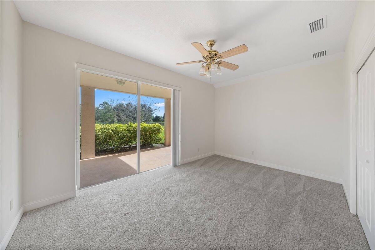 2940 Pomello Road Malabar, FL 32950 - Photo 25 of 42 a view of a livingroom with a ceiling fan and window