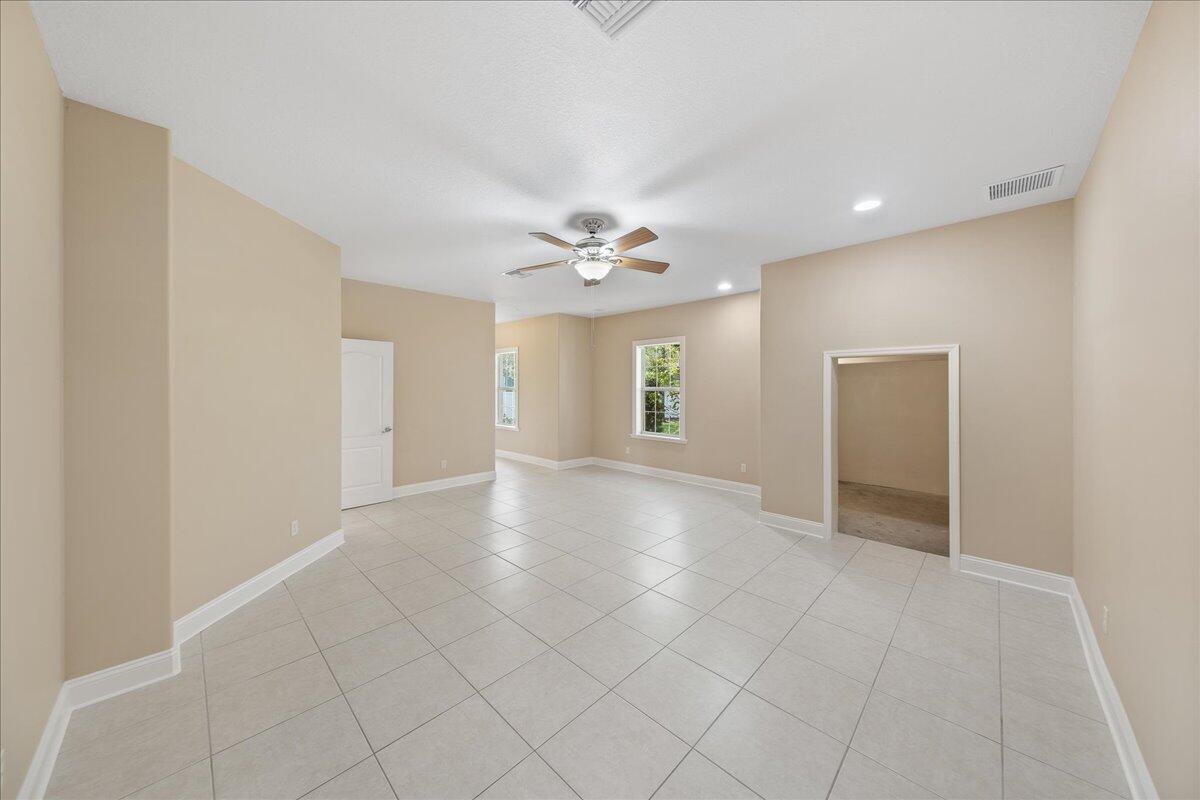 2940 Pomello Road Malabar, FL 32950 - Photo 29 of 42 a view of an empty room with a window