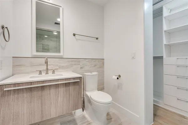 a bathroom with a sink and a toilet