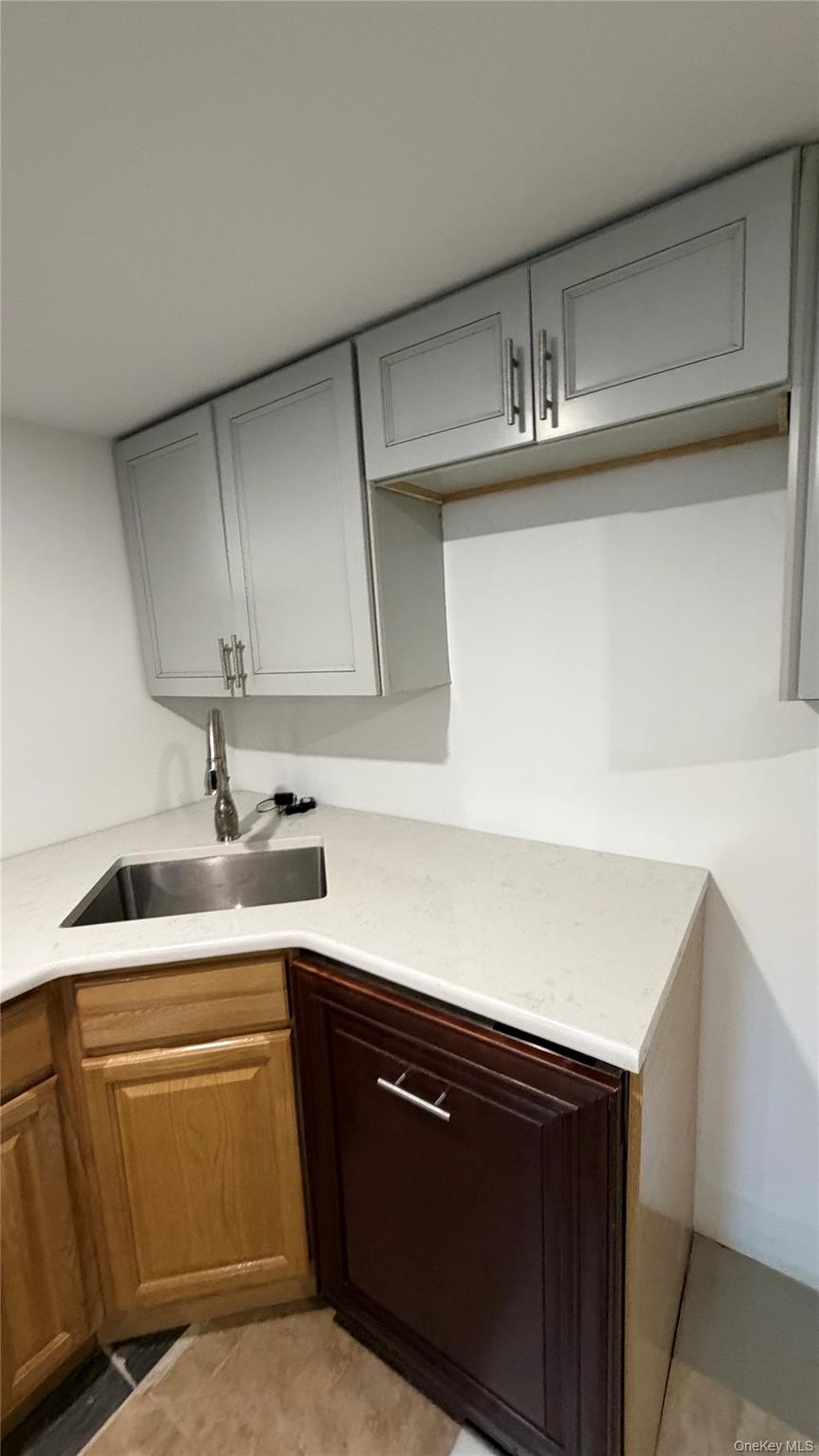 2 Wyman Street, Unit 1 Rye Brook, NY 10573 - Photo 13 of 13 a kitchen with a sink and cabinets