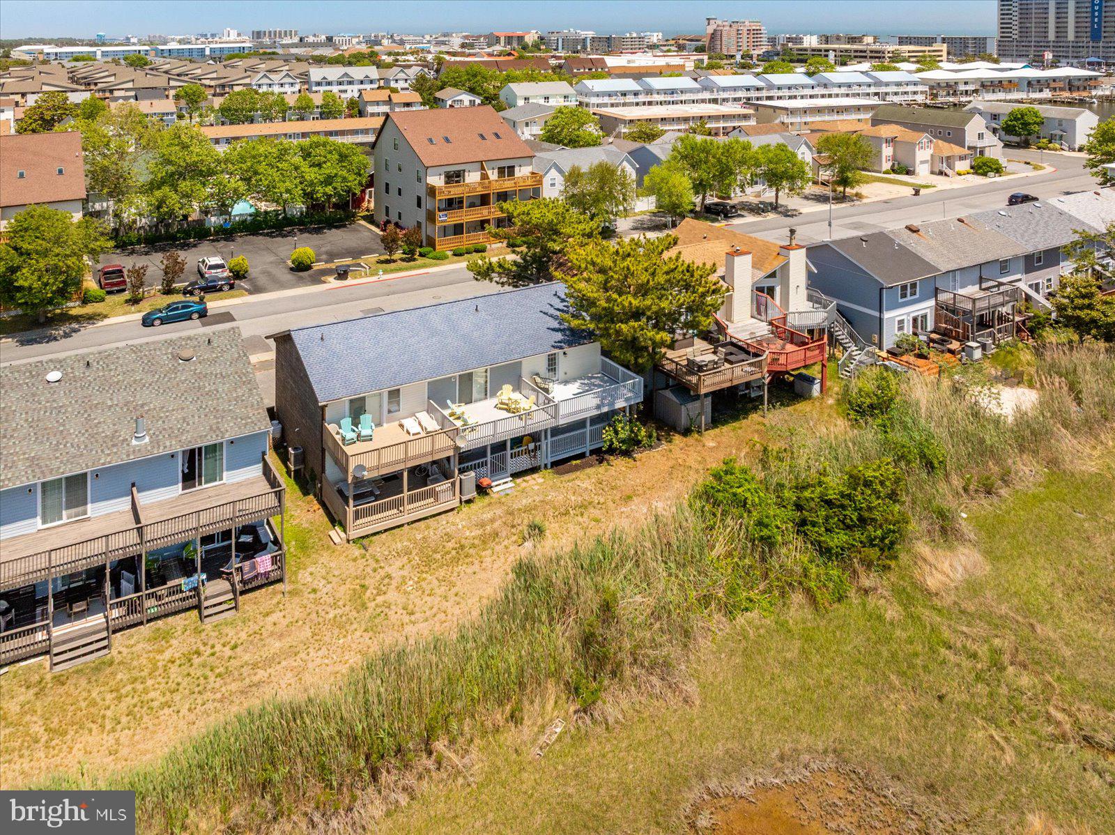 135 Jamestown Road, Unit 18A Ocean City, MD 21842 - Photo 57 of 63 a view of a city with lawn chairs