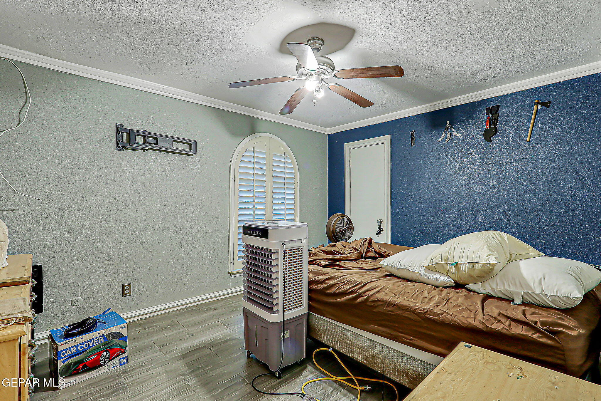 14800 Kingston Road Horizon City, TX 79928 - Photo 11 of 82 a bedroom with a bed and wooden floor