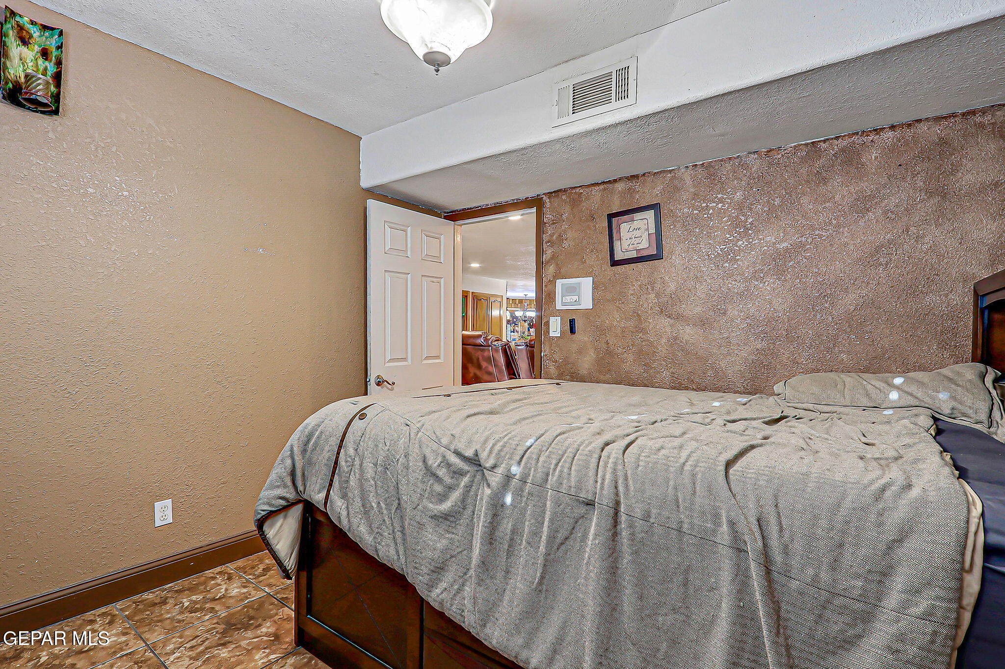 14800 Kingston Road Horizon City, TX 79928 - Photo 16 of 82 a bedroom with a bed and a window