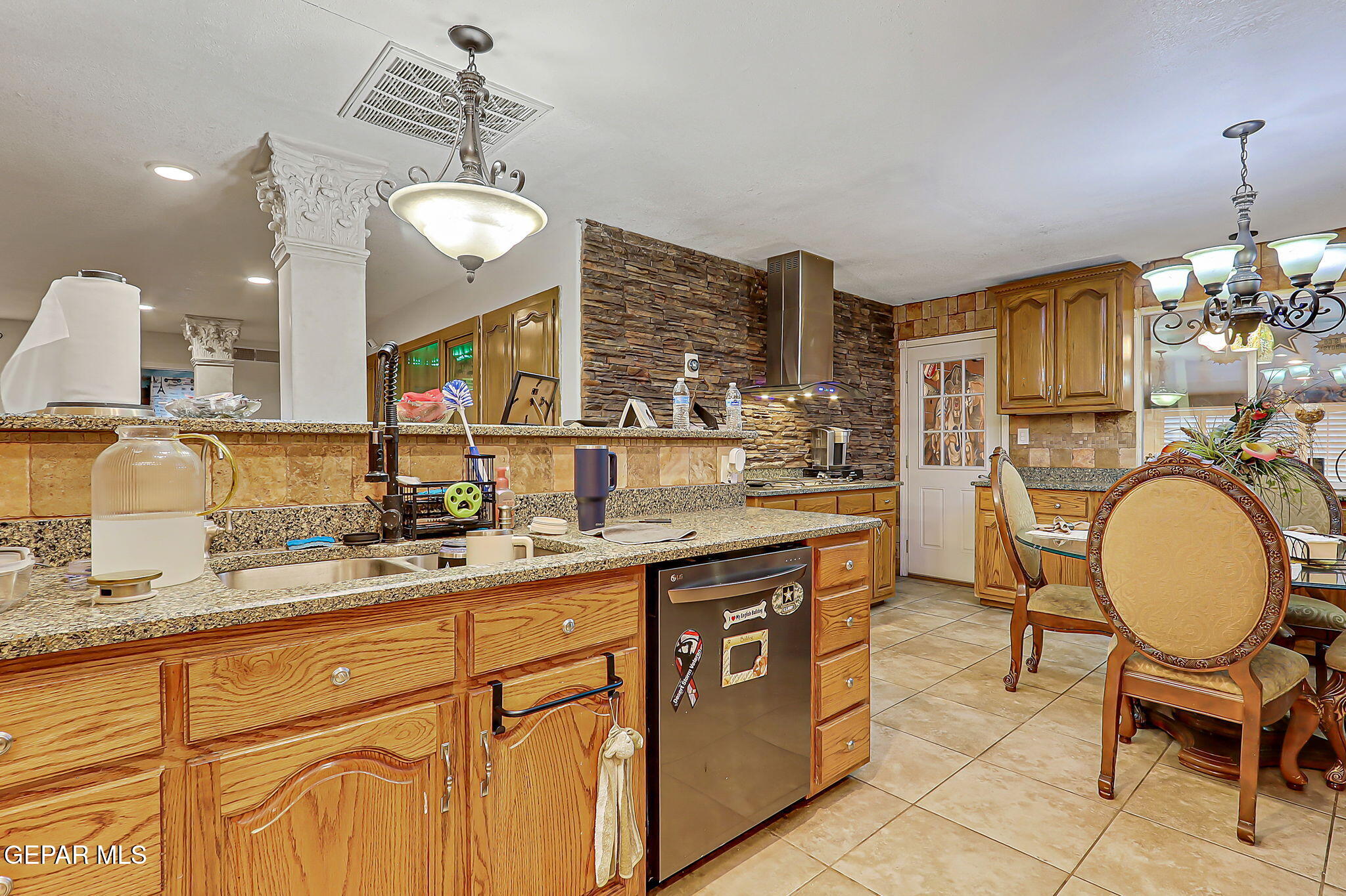 14800 Kingston Road Horizon City, TX 79928 - Photo 29 of 82 a spacious bathroom with a granite countertop sink a mirror and a vanity