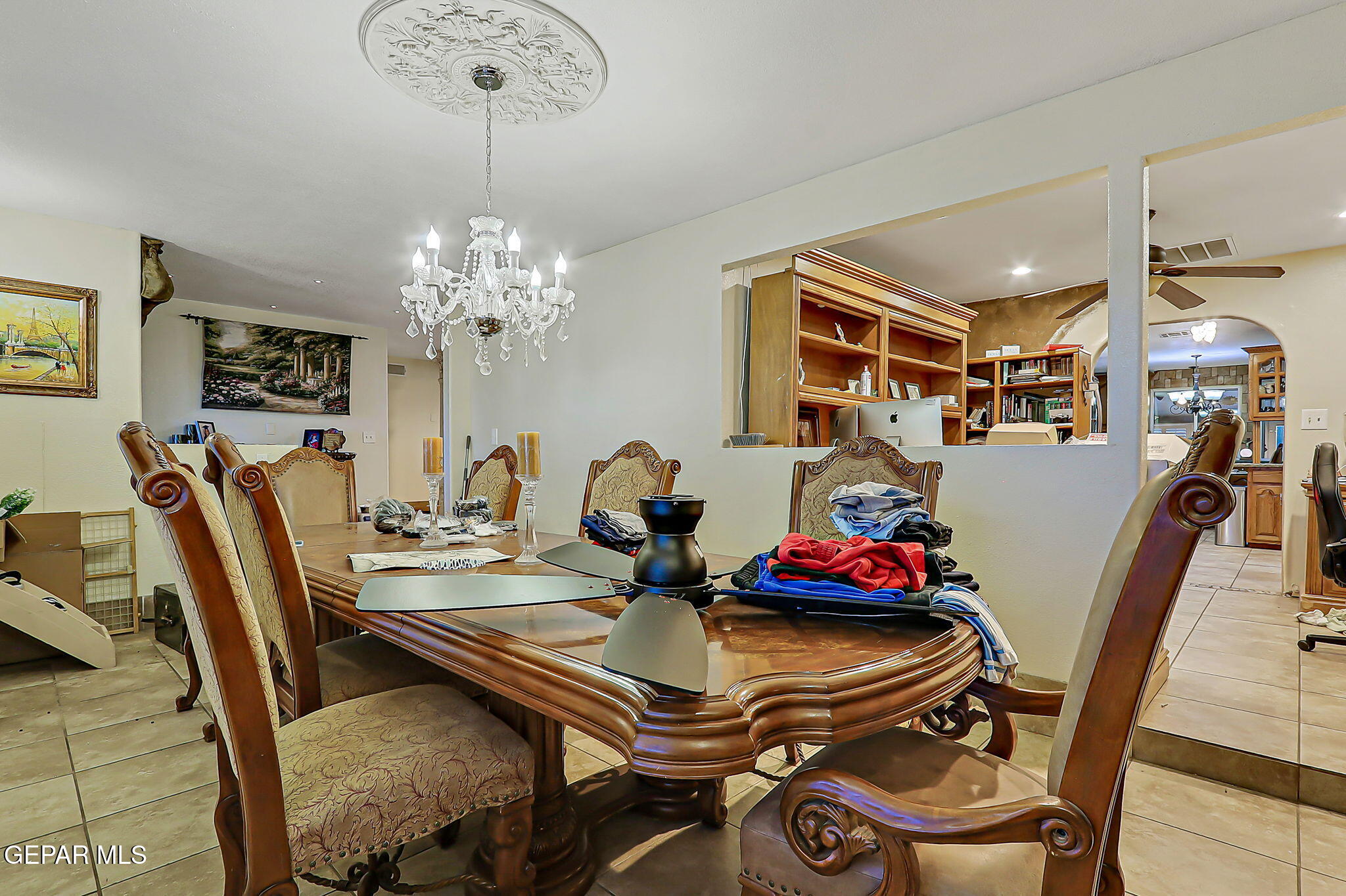 14800 Kingston Road Horizon City, TX 79928 - Photo 34 of 82 a view of a dining room with furniture and chandelier