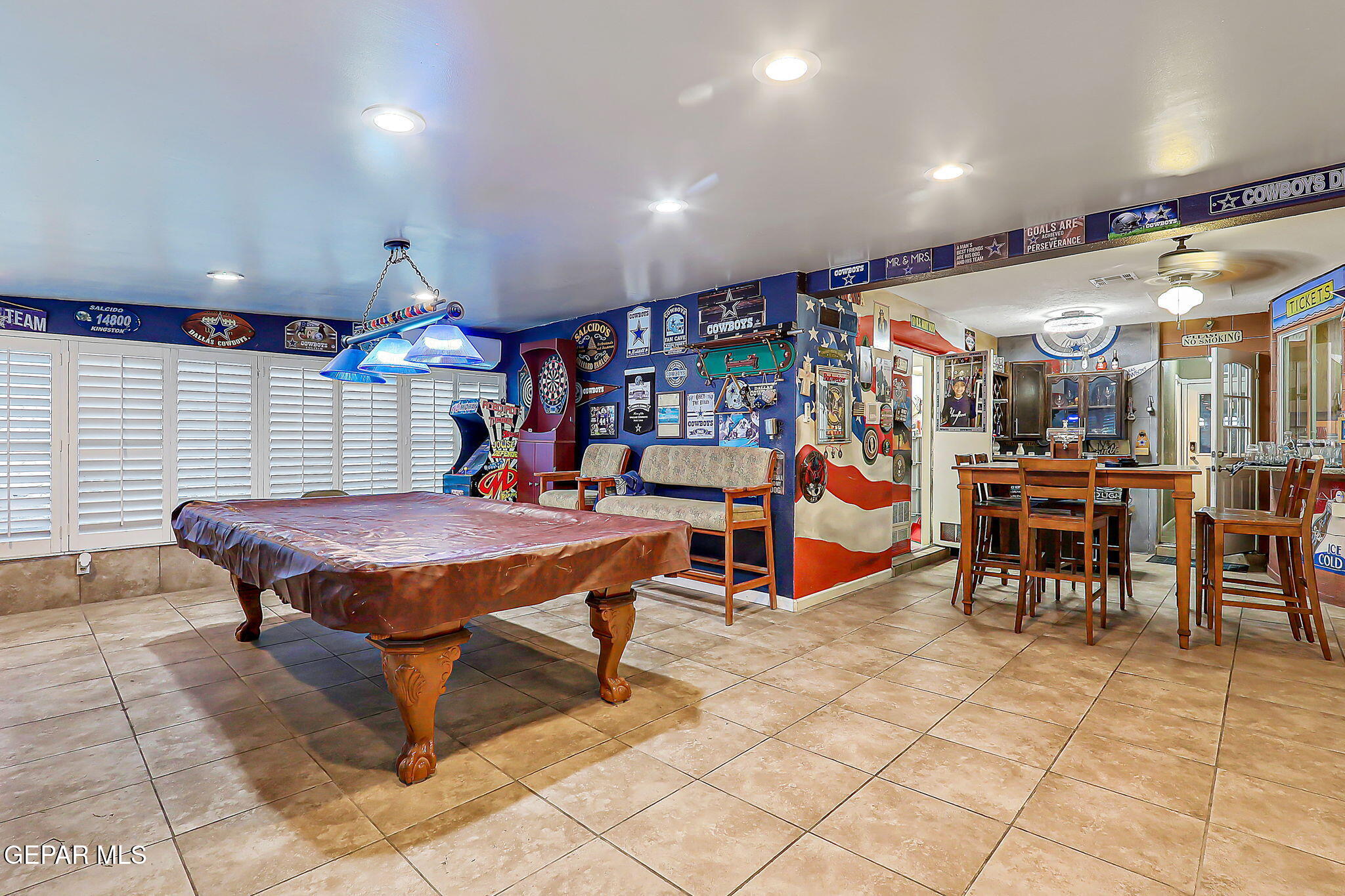 14800 Kingston Road Horizon City, TX 79928 - Photo 41 of 82 a living room with furniture a table tennis table and a rug