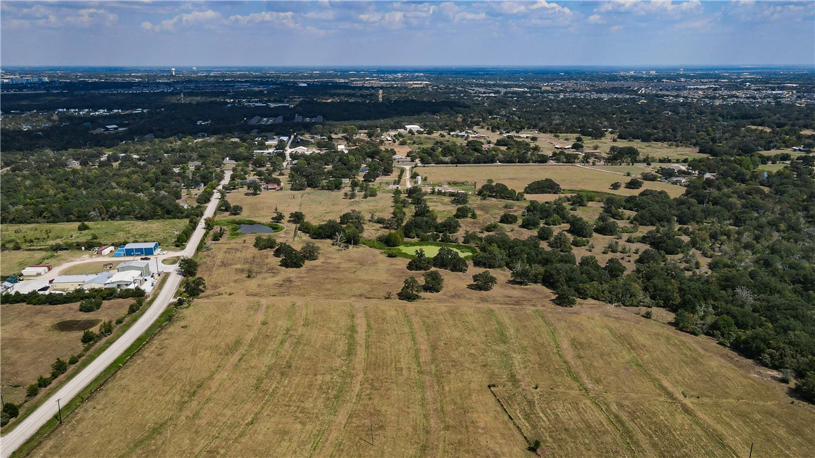 2 Hopes Creek Road College Station, TX 77845 - Photo 4 of 6 an aerial view of residential houses with outdoor space