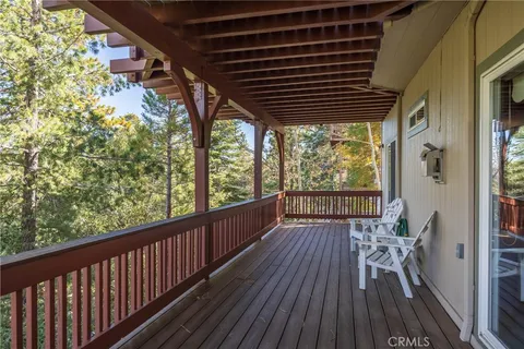 a view of balcony with wooden floor and outdoor space