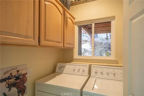 a bathroom with a sink and a window