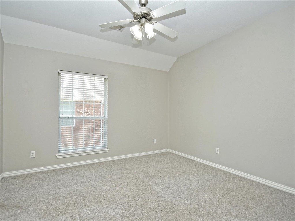 1001 Krenek Tap Road, Unit 2002 College Station, TX 77840 - Photo 14 of 20 an empty room with a window and a fan