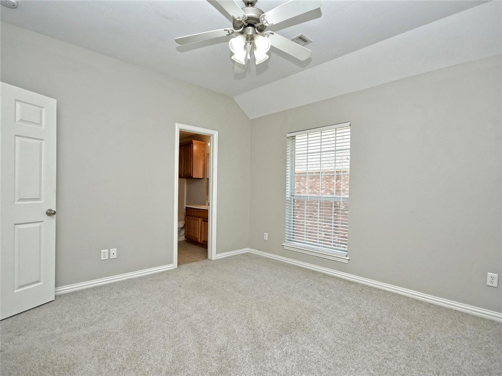 1001 Krenek Tap Road, Unit 2002 College Station, TX 77840 - Photo 16 of 20 an empty room with fan and windows