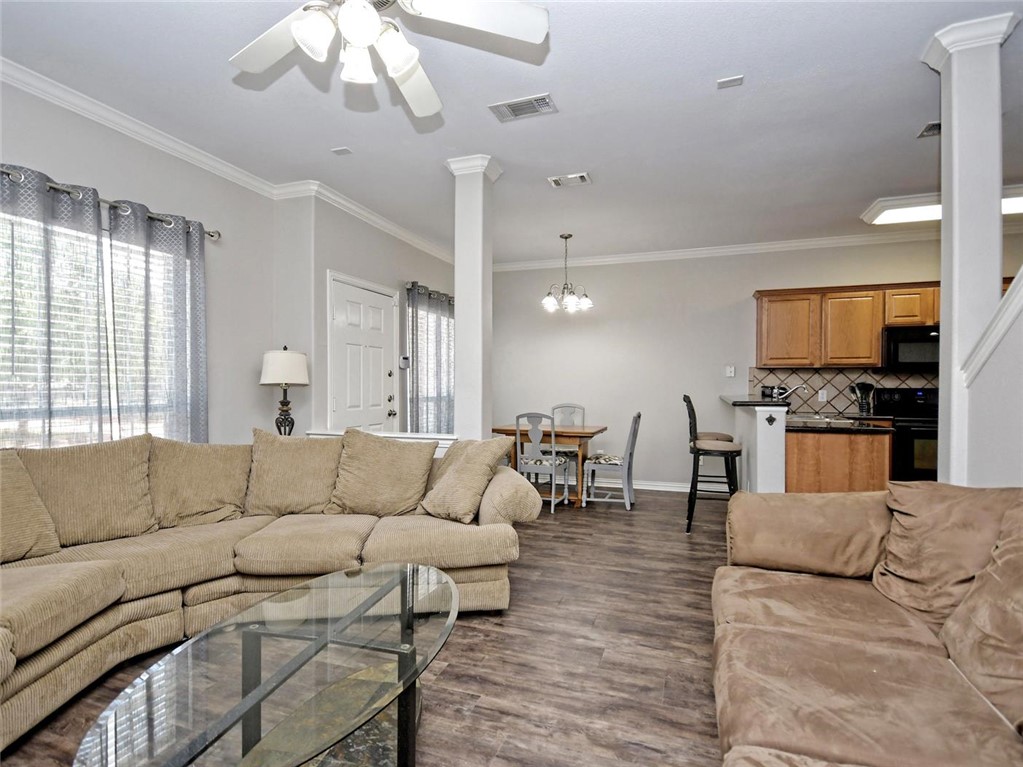1001 Krenek Tap Road, Unit 2002 College Station, TX 77840 - Photo 5 of 20 a living room with furniture and a large window