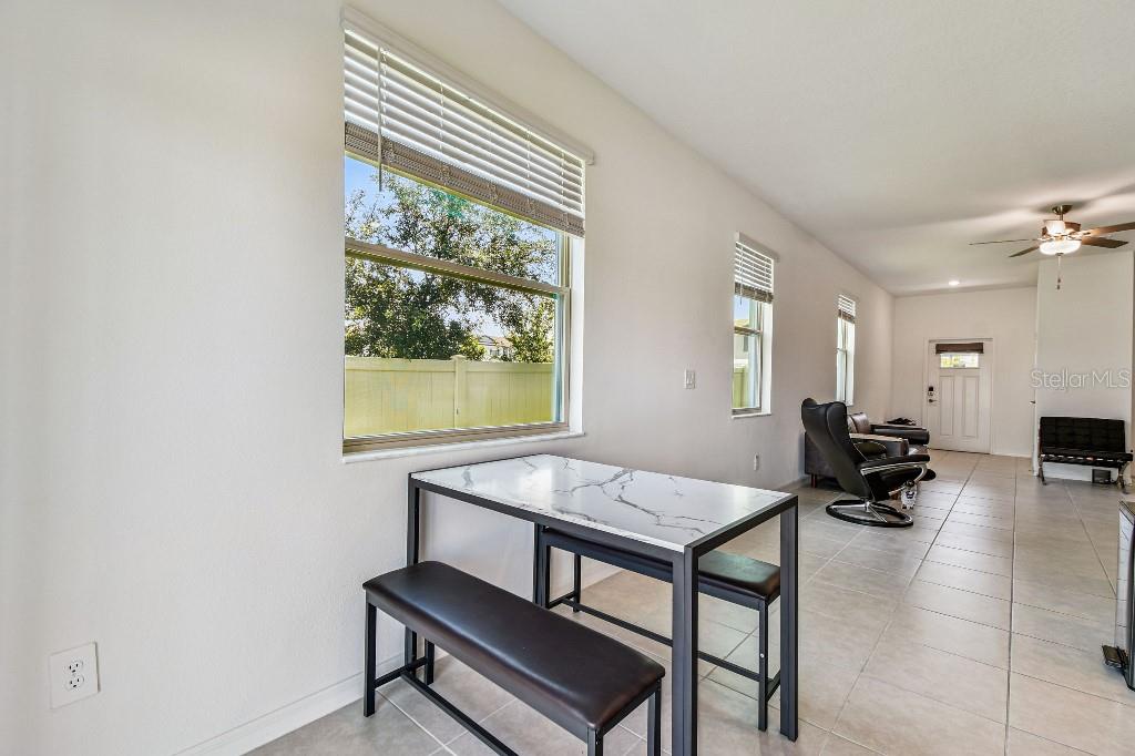 8331 Corner Pine Way New Port Richey, FL 34655 - Photo 18 of 41 a living room with furniture and a window