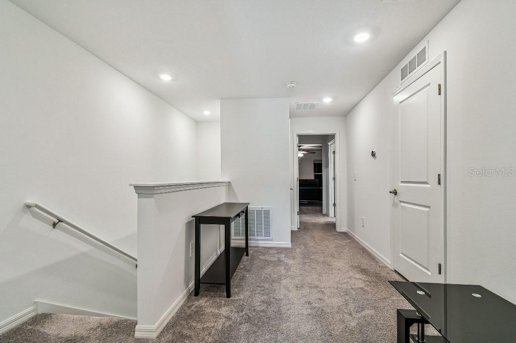 8331 Corner Pine Way New Port Richey, FL 34655 - Photo 26 of 41 a view of entryway with white walls
