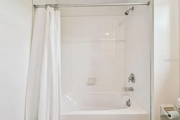 a view of a hallway with closet