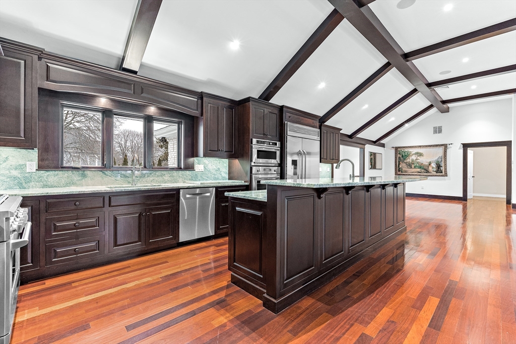 10 Viking Road Winchester, MA 01890 - Photo 13 of 42 a kitchen with a sink appliances wooden floor and a window