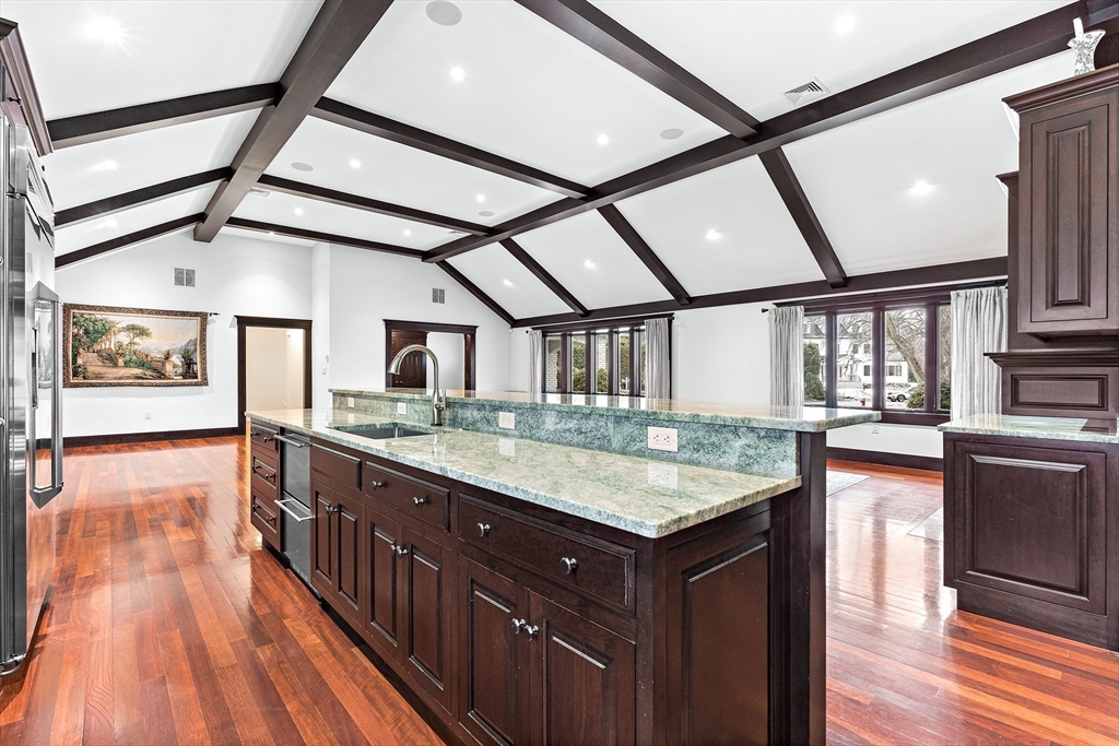 10 Viking Road Winchester, MA 01890 - Photo 15 of 42 a bathroom with a granite countertop sink and large window