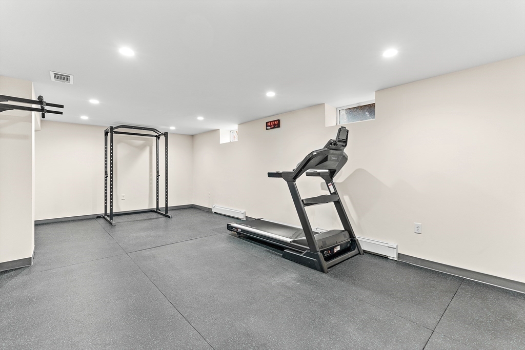 10 Viking Road Winchester, MA 01890 - Photo 31 of 42 a view of a room with gym equipment