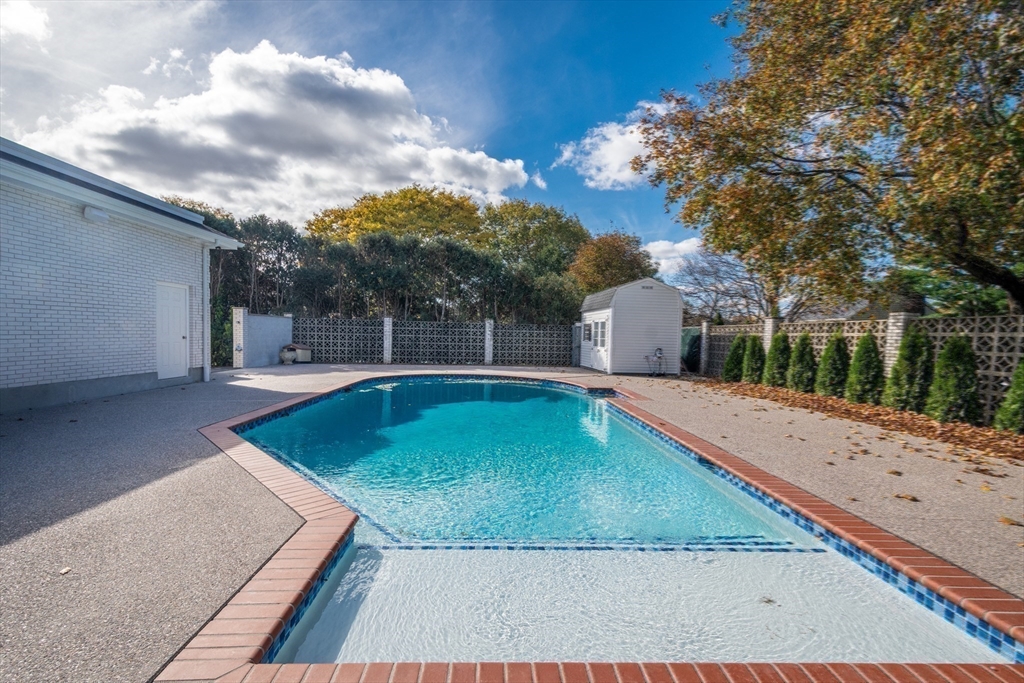 10 Viking Road Winchester, MA 01890 - Photo 39 of 42 a view of a swimming pool with a yard