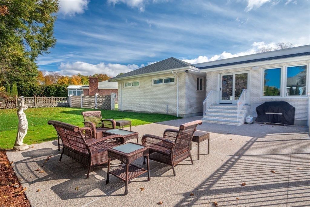 10 Viking Road Winchester, MA 01890 - Photo 40 of 42 a patio with table and chairs
