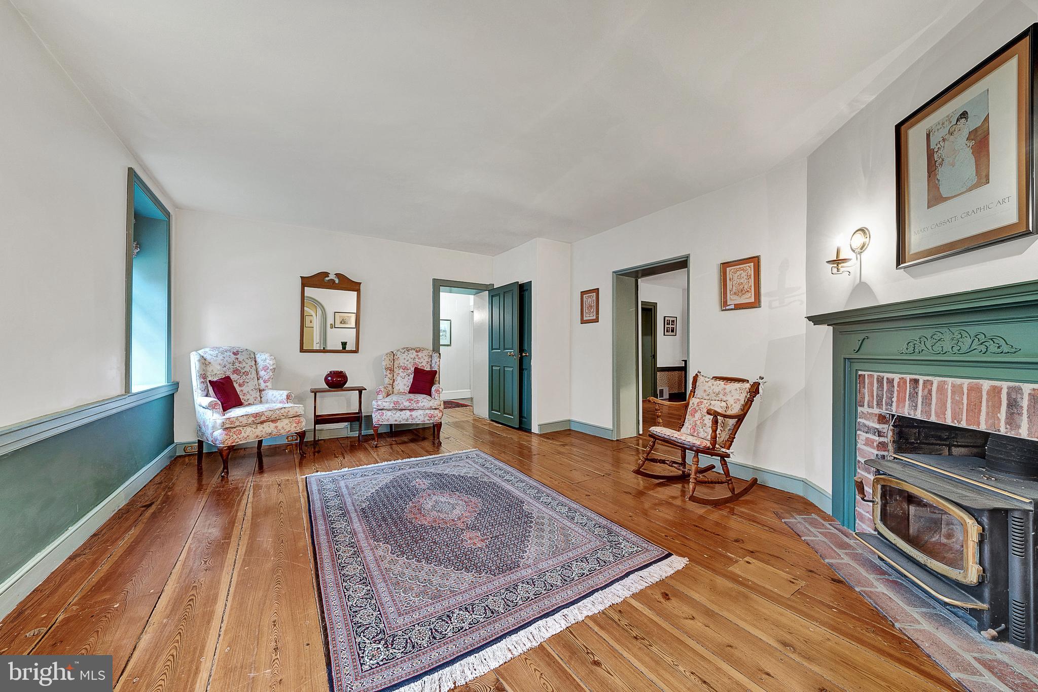 125 East Bells Mill Road Philadelphia, PA 19118 - Photo 41 of 67 Sitting Area with Wood Stove