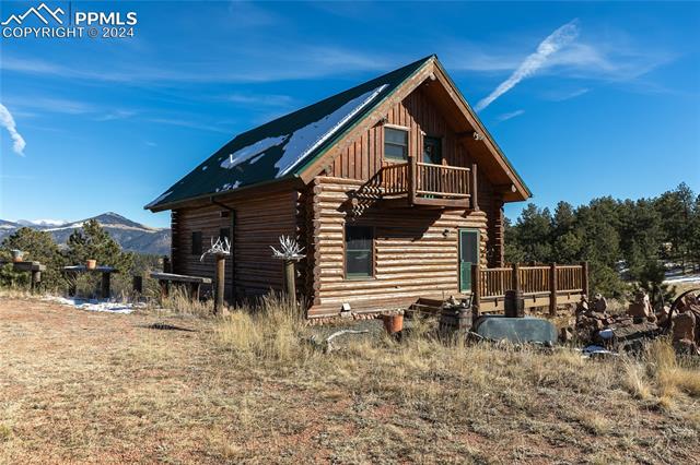 622 Sioux Road Florissant, CO 80816 - Photo 1 of 43 View of home's exterior with a mountain view and a balcony