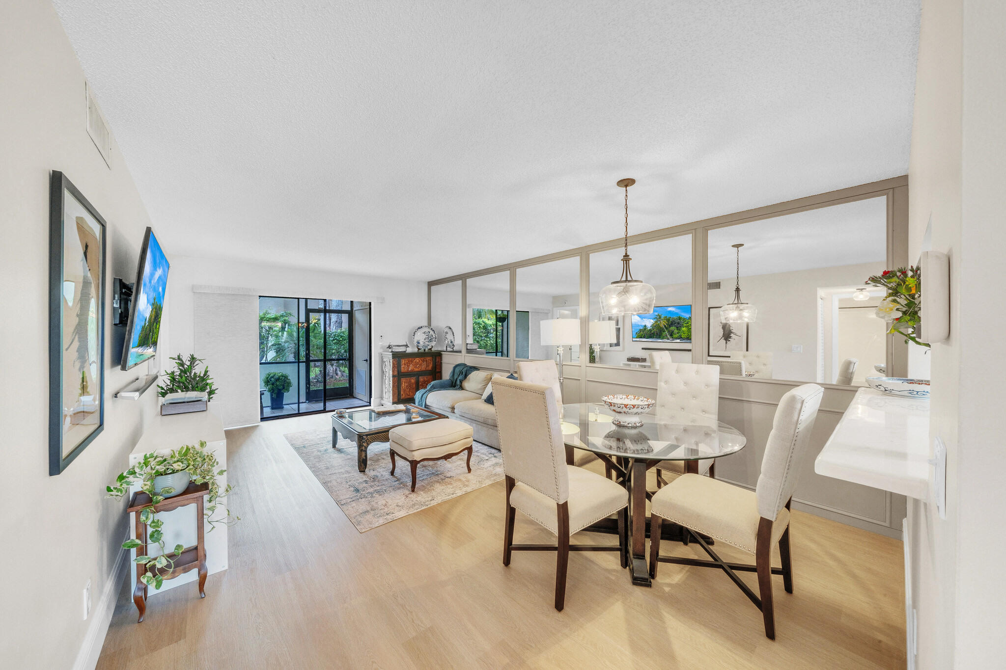 22136 Palms Way, Unit 103 Boca Raton, FL 33433 - Photo 8 of 42 a dining room with furniture and window