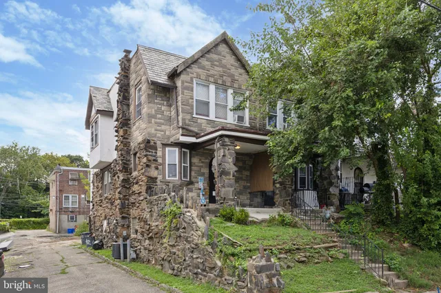 front view of house with a garden