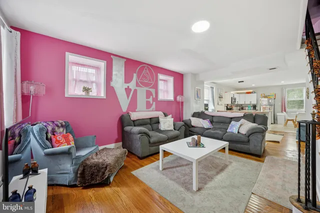 a living room with furniture and a couch