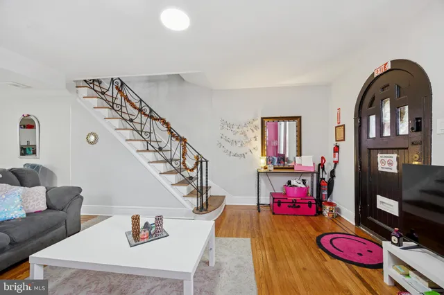 a living room with furniture and rug