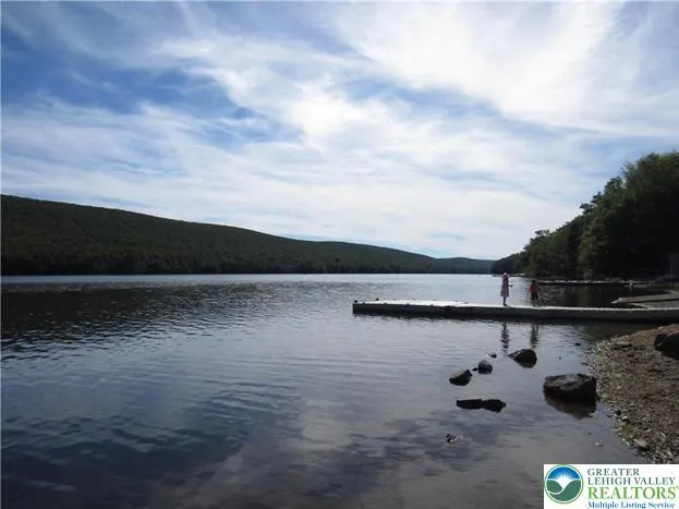 a view of outside space and lake view