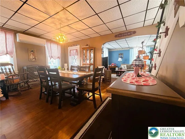 a view of a dining room with furniture window and outside view
