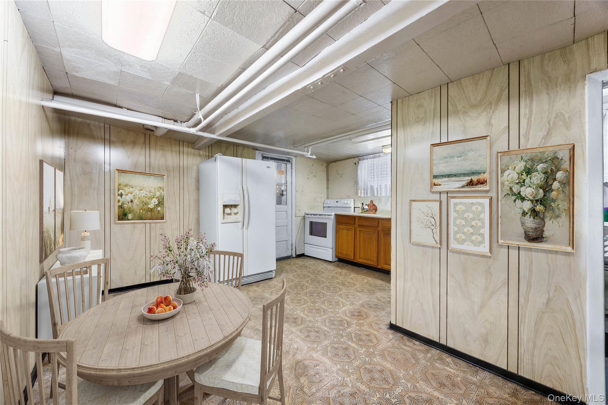 37-07 20th Road Queens, NY 11105 - Photo 14 of 24 a view of a kitchen with furniture and wooden floor