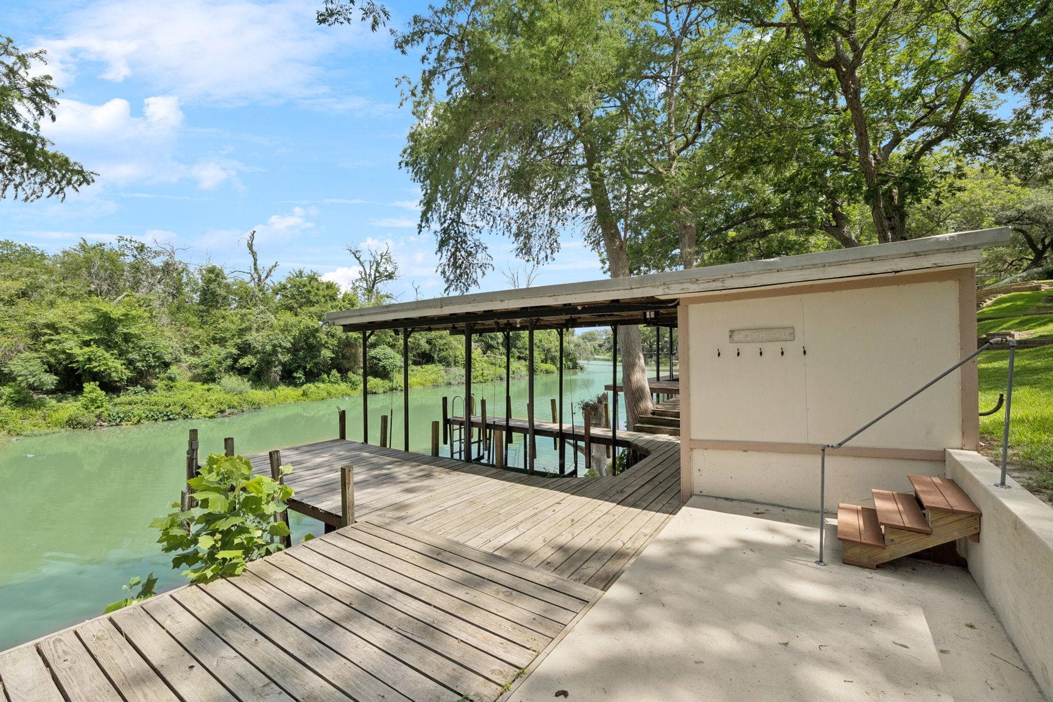 a view of balcony with mountain view and lake view