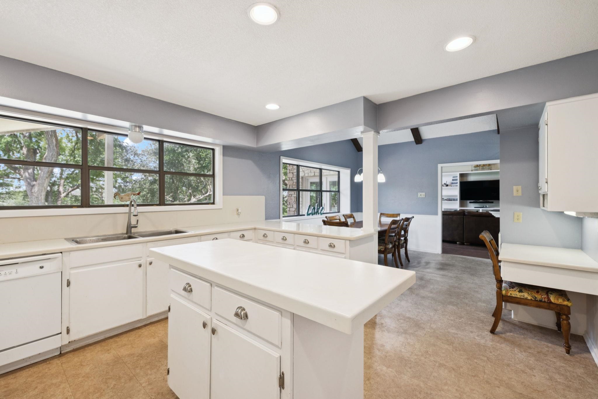 180 Wampum Way Seguin, TX 78155 - Photo 20 of 24 a view of a kitchen with center island and stainless steel appliances